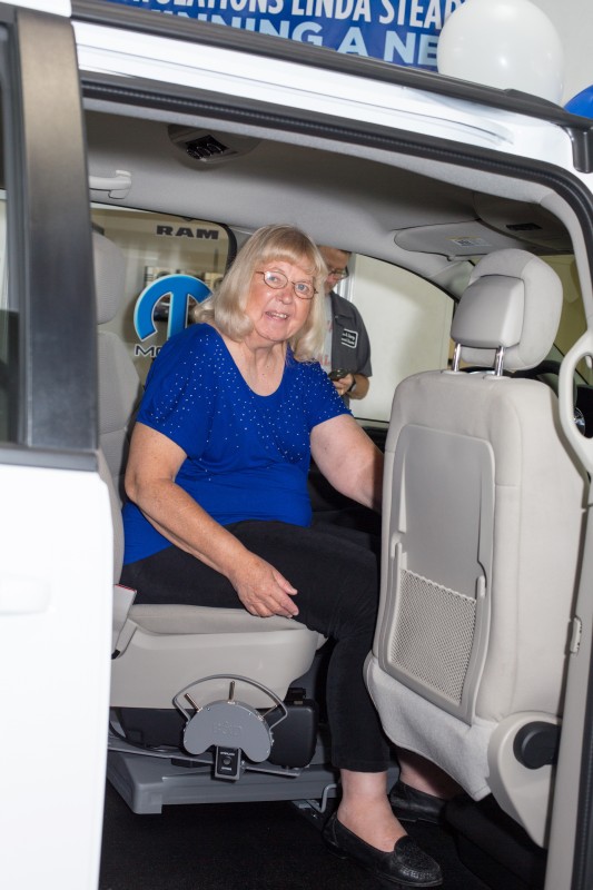 Linda Stearns in her new wheelchair-accessible 2014 Dodge Grand Caravan. Linda is pictured in the swivel driver’s seat, which was installed by B&D Independence Inc., Mt. Carmel, Ill.