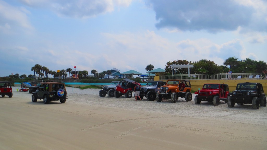 Jeeps driving on the beach 2