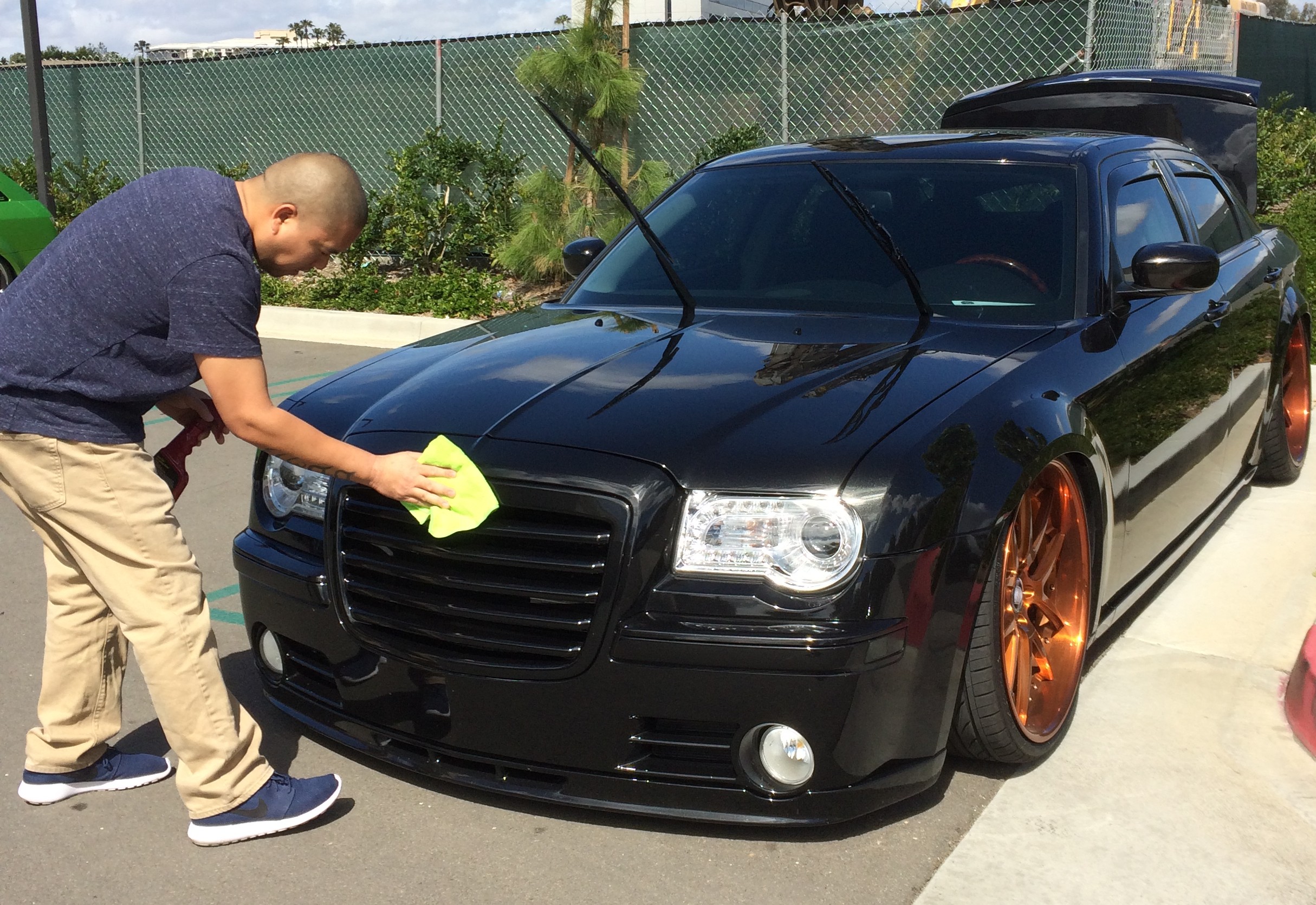 Ron Rodriguez cleans up his Chrysler 300C.