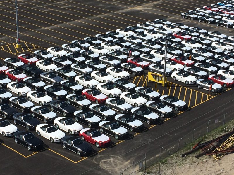 Hundreds of Fiat 124 Spiders at their "point of rest" prior to being shipped to dealers.