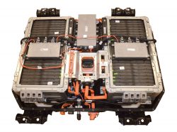 The 2017 Chrysler Pacifica Hybrid features a 16-kWh lithium-ion battery pack (shown with cover off) that is stored under the second row floor.